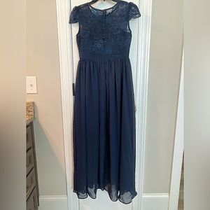 Lovely long gown for young lady.  Worn one time in wedding.